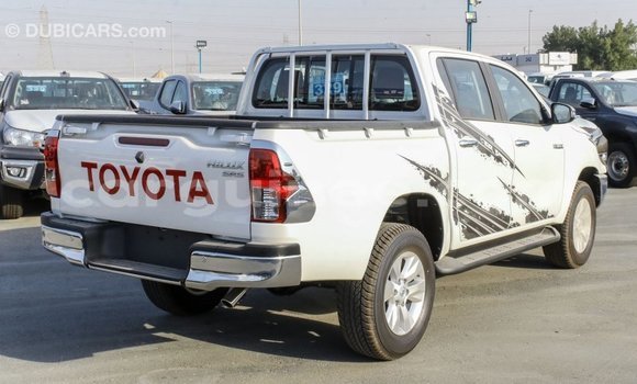 Buy Import Toyota Hilux White Car in Import - Dubai in Conakry Buy Import Toyota Hilux White Car in Import - Dubai in Conakry