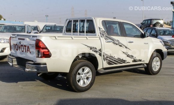 Acheter Import Voiture Toyota Hilux Blanc à Import - Dubai, Conakry Acheter Import Voiture Toyota Hilux Blanc à Import - Dubai, Conakry