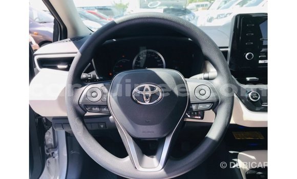 Buy Import Toyota Corolla White Car in Import - Dubai in Conakry Buy Import Toyota Corolla White Car in Import - Dubai in Conakry