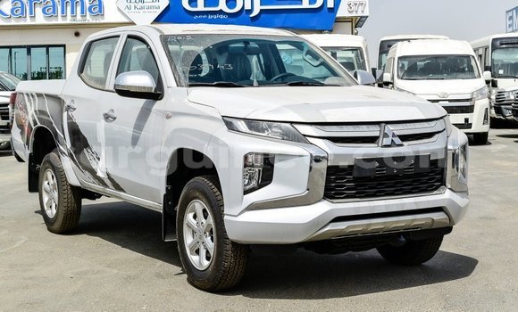 Buy Import Mitsubishi L200 White Car in Import - Dubai in Conakry Buy Import Mitsubishi L200 White Car in Import - Dubai in Conakry
