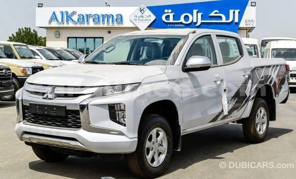 Buy Import Mitsubishi L200 White Car in Import - Dubai in Conakry Buy Import Mitsubishi L200 White Car in Import - Dubai in Conakry