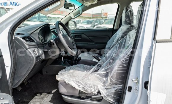 Buy Import Mitsubishi L200 White Car in Import - Dubai in Conakry Buy Import Mitsubishi L200 White Car in Import - Dubai in Conakry