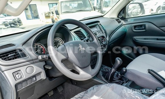 Buy Import Mitsubishi L200 White Car in Import - Dubai in Conakry Buy Import Mitsubishi L200 White Car in Import - Dubai in Conakry