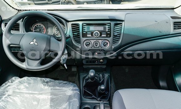 Buy Import Mitsubishi L200 White Car in Import - Dubai in Conakry Buy Import Mitsubishi L200 White Car in Import - Dubai in Conakry
