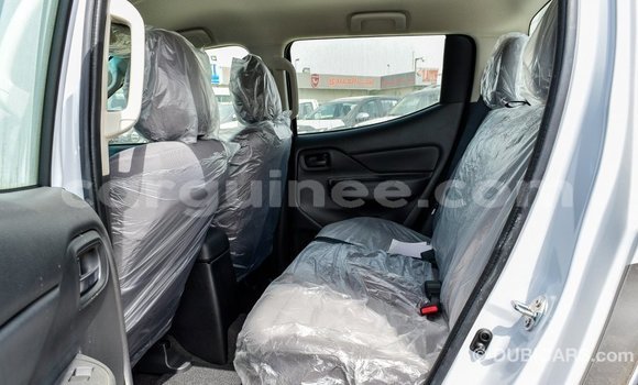 Buy Import Mitsubishi L200 White Car in Import - Dubai in Conakry Buy Import Mitsubishi L200 White Car in Import - Dubai in Conakry