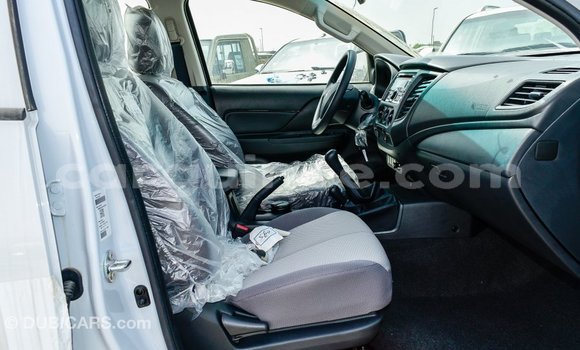 Buy Import Mitsubishi L200 White Car in Import - Dubai in Conakry Buy Import Mitsubishi L200 White Car in Import - Dubai in Conakry