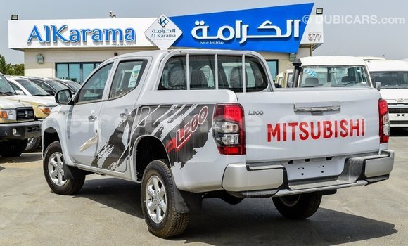 Buy Import Mitsubishi L200 White Car in Import - Dubai in Conakry Buy Import Mitsubishi L200 White Car in Import - Dubai in Conakry