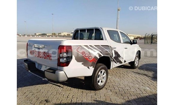 Buy Import Mitsubishi L200 White Car in Import - Dubai in Conakry Buy Import Mitsubishi L200 White Car in Import - Dubai in Conakry