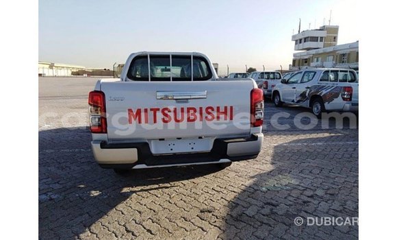 Buy Import Mitsubishi L200 White Car in Import - Dubai in Conakry Buy Import Mitsubishi L200 White Car in Import - Dubai in Conakry