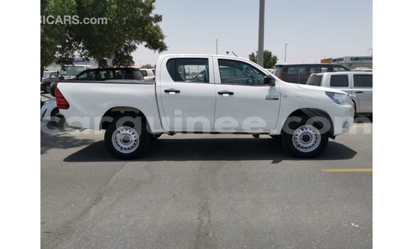 Buy Import Toyota Hilux White Car in Import - Dubai in Conakry Buy Import Toyota Hilux White Car in Import - Dubai in Conakry