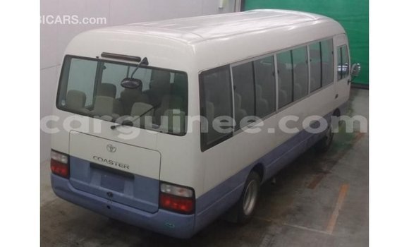 Acheter Import Voiture Toyota Coaster Blanc à Import - Dubai, Conakry Acheter Import Voiture Toyota Coaster Blanc à Import - Dubai, Conakry