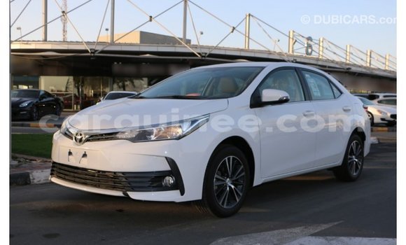 Buy Import Toyota Corolla White Car in Import - Dubai in Conakry Buy Import Toyota Corolla White Car in Import - Dubai in Conakry