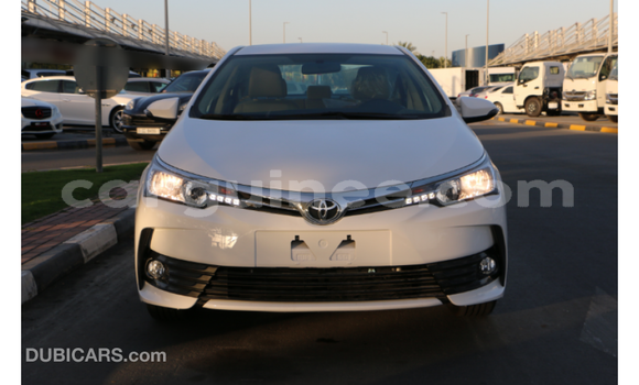 Buy Import Toyota Corolla White Car in Import - Dubai in Conakry Buy Import Toyota Corolla White Car in Import - Dubai in Conakry