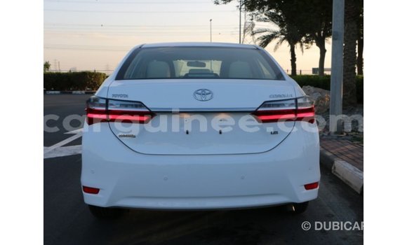 Buy Import Toyota Corolla White Car in Import - Dubai in Conakry Buy Import Toyota Corolla White Car in Import - Dubai in Conakry