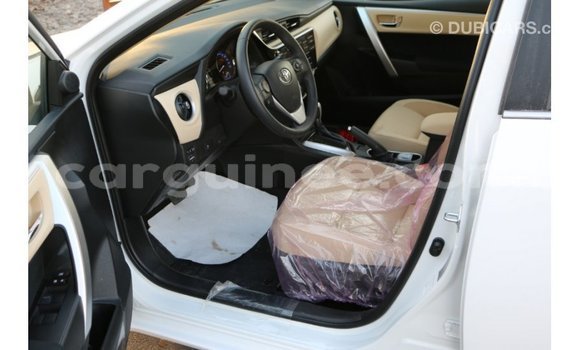 Buy Import Toyota Corolla White Car in Import - Dubai in Conakry Buy Import Toyota Corolla White Car in Import - Dubai in Conakry