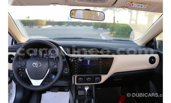 Buy Import Toyota Corolla White Car in Import - Dubai in Conakry Buy Import Toyota Corolla White Car in Import - Dubai in Conakry