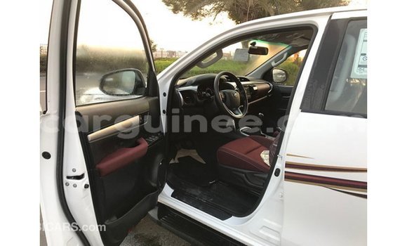Buy Import Toyota Hilux White Car in Import - Dubai in Conakry Buy Import Toyota Hilux White Car in Import - Dubai in Conakry