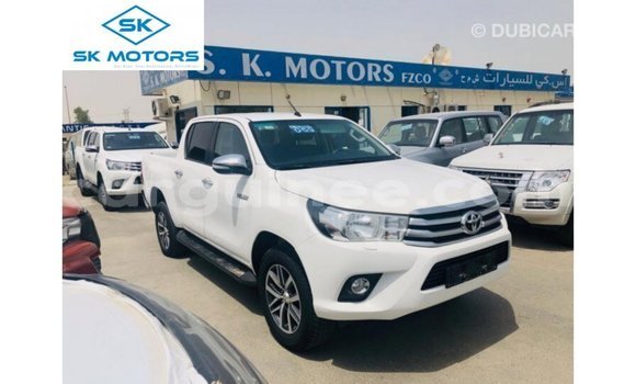 Acheter Import Voiture Toyota Hilux Blanc à Import - Dubai, Conakry Acheter Import Voiture Toyota Hilux Blanc à Import - Dubai, Conakry