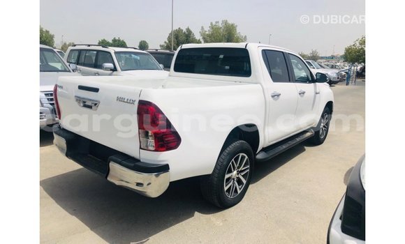 Acheter Import Voiture Toyota Hilux Blanc à Import - Dubai, Conakry Acheter Import Voiture Toyota Hilux Blanc à Import - Dubai, Conakry