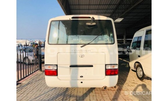 Acheter Import Voiture Toyota Coaster Blanc à Import - Dubai, Conakry Acheter Import Voiture Toyota Coaster Blanc à Import - Dubai, Conakry