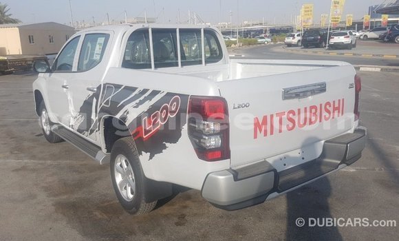 Buy Import Mitsubishi L200 White Car in Import - Dubai in Conakry Buy Import Mitsubishi L200 White Car in Import - Dubai in Conakry
