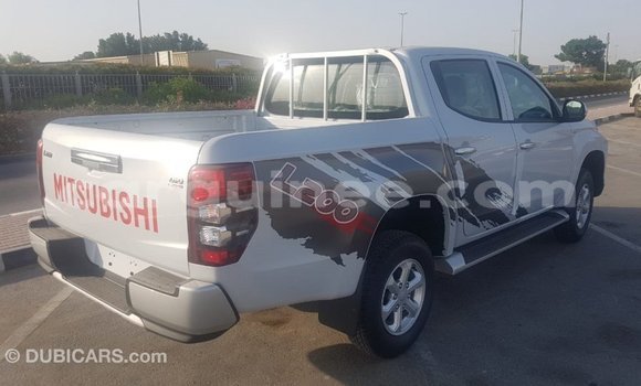 Buy Import Mitsubishi L200 White Car in Import - Dubai in Conakry Buy Import Mitsubishi L200 White Car in Import - Dubai in Conakry