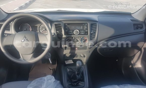 Buy Import Mitsubishi L200 White Car in Import - Dubai in Conakry Buy Import Mitsubishi L200 White Car in Import - Dubai in Conakry