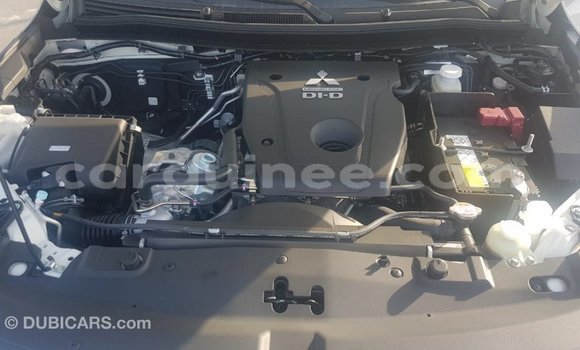 Buy Import Mitsubishi L200 White Car in Import - Dubai in Conakry Buy Import Mitsubishi L200 White Car in Import - Dubai in Conakry