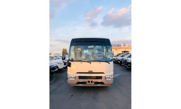 Acheter Import Voiture Toyota Coaster Blanc à Import - Dubai, Conakry