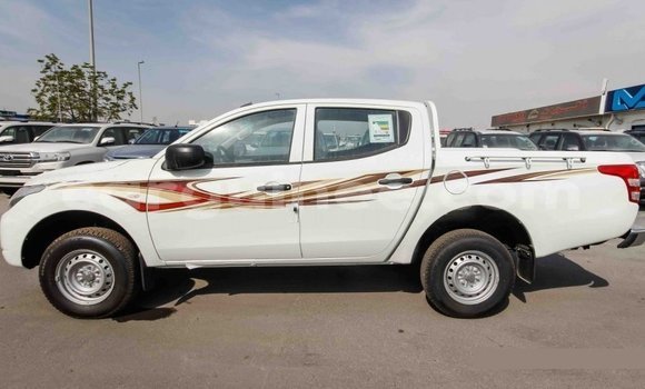 Buy Import Mitsubishi L200 White Car in Import - Dubai in Conakry Buy Import Mitsubishi L200 White Car in Import - Dubai in Conakry