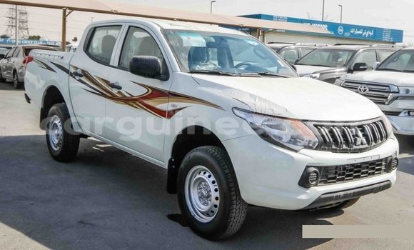 Buy Import Mitsubishi L200 White Car in Import - Dubai in Conakry Buy Import Mitsubishi L200 White Car in Import - Dubai in Conakry