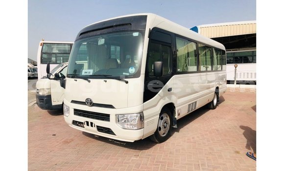 Buy Import Toyota Coaster White Car in Import - Dubai in Conakry
