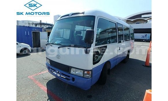 Buy Import Toyota Coaster White Car in Import - Dubai in Conakry