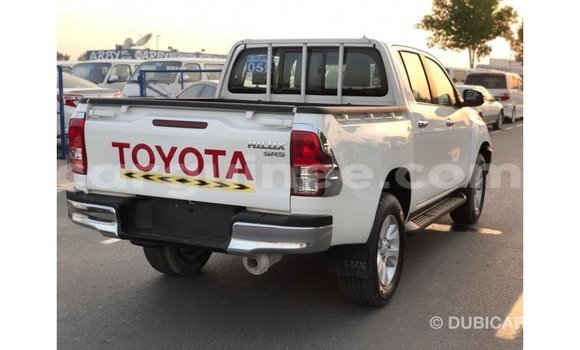 Acheter Import Voiture Toyota Hilux Blanc à Import - Dubai, Conakry Acheter Import Voiture Toyota Hilux Blanc à Import - Dubai, Conakry