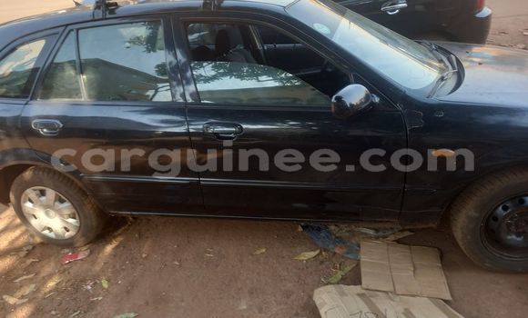 Buy Used Mazda 323 Black Car in Conakry in Conakry Buy Used Mazda 323 Black Car in Conakry in Conakry