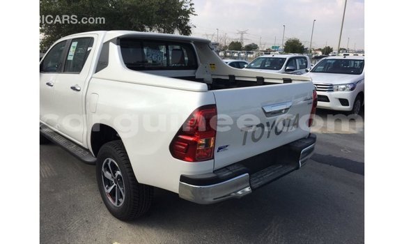 Buy Import Toyota Hilux White Car in Import - Dubai in Conakry Buy Import Toyota Hilux White Car in Import - Dubai in Conakry