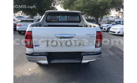 Buy Import Toyota Hilux White Car in Import - Dubai in Conakry Buy Import Toyota Hilux White Car in Import - Dubai in Conakry