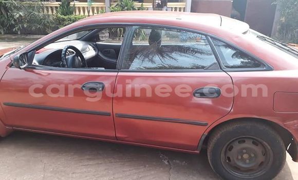 Acheter Occasion Voiture Mazda 323 Rouge à Conakry, Conakry Acheter Occasion Voiture Mazda 323 Rouge à Conakry, Conakry